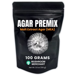 Agar premix in a black bag. A picture of white mycelium contrasts the matte black bag the MEA Premix is contained in.